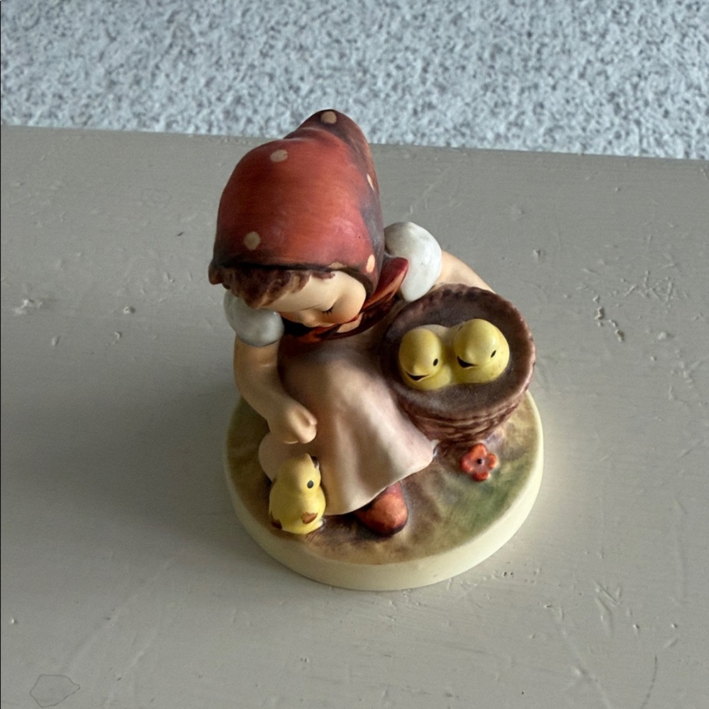 Vintage Figurine with Red Hood and Yellow Chicks